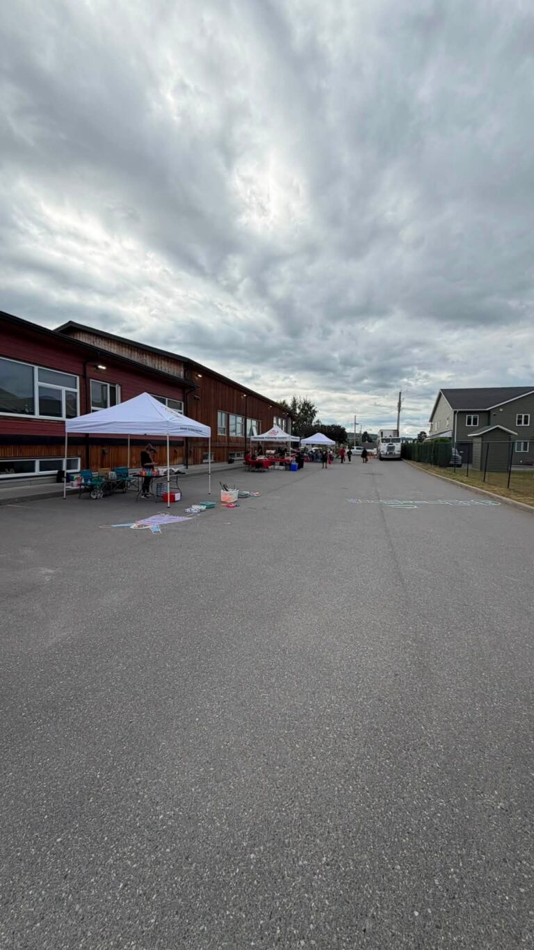Event tents set up along the street beside the building.