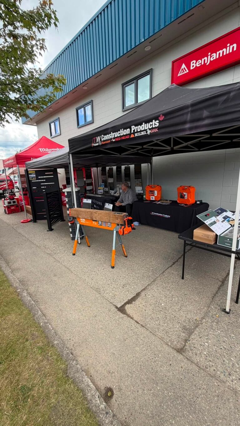 Vendor tent with product displays beside the store.