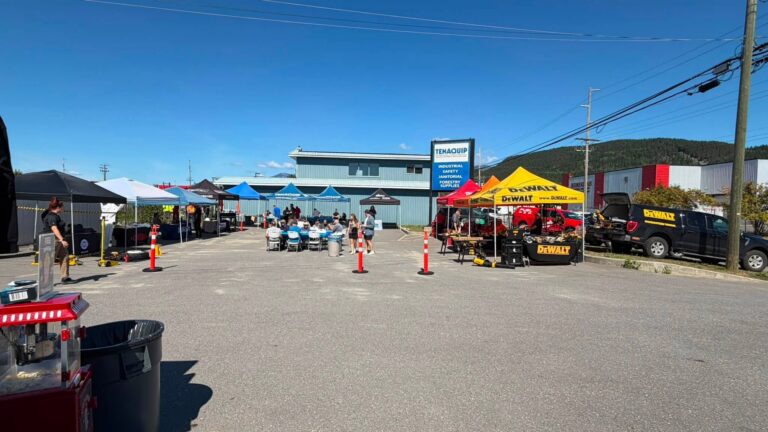 Vendor tents set up in the TENAQUIP Terrace parking lot.