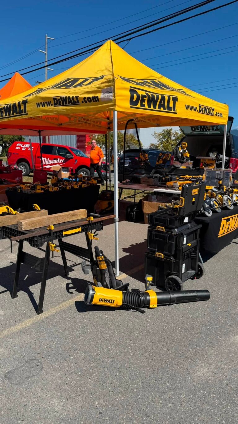 DeWalt tent with tools on display.